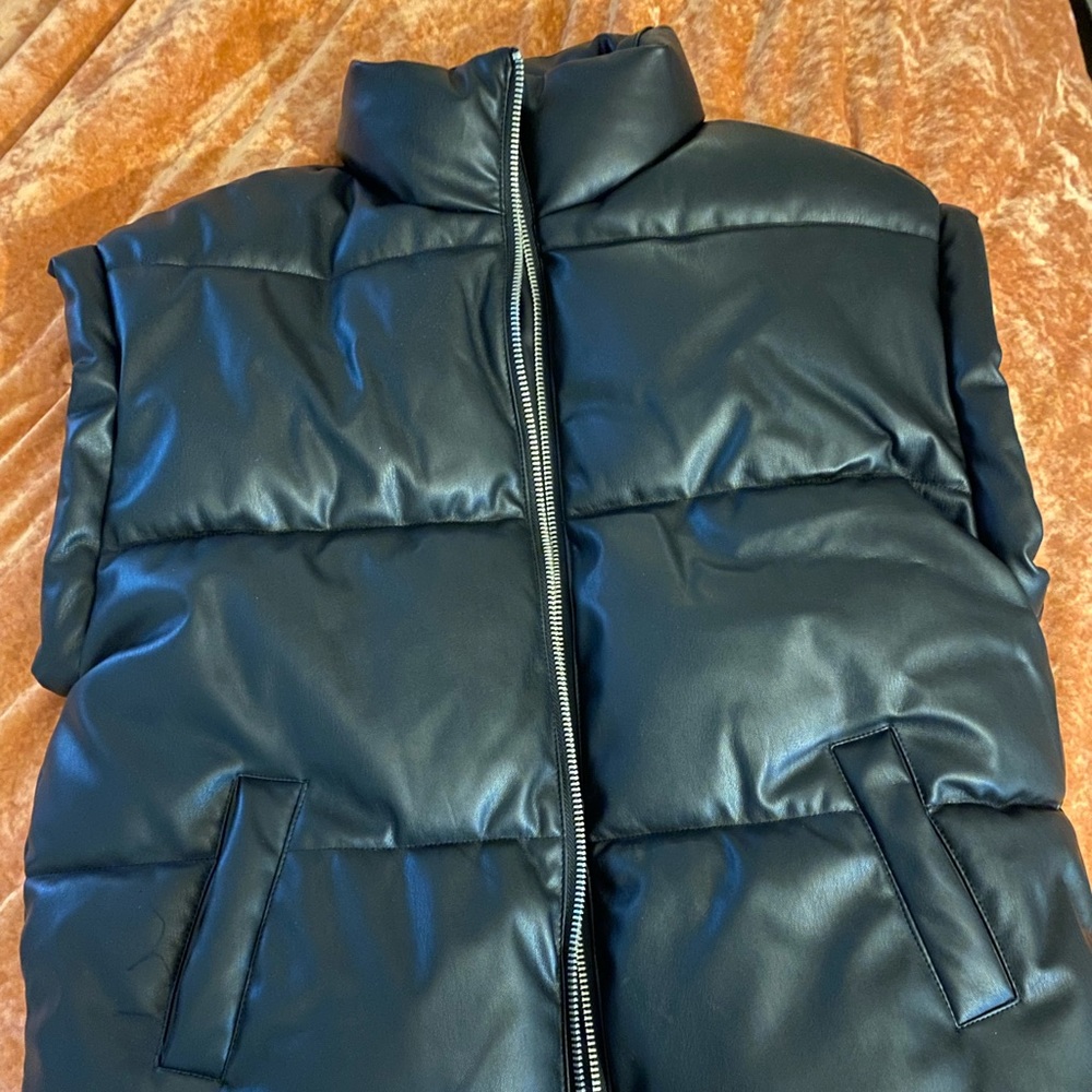 Black puffy vest faux leather